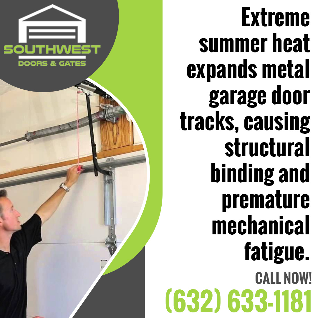 Technician inspecting garage door track and spring