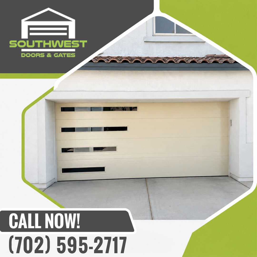 Modern beige flush panel garage door featuring horizontal offset frosted glass windows on a residential home.