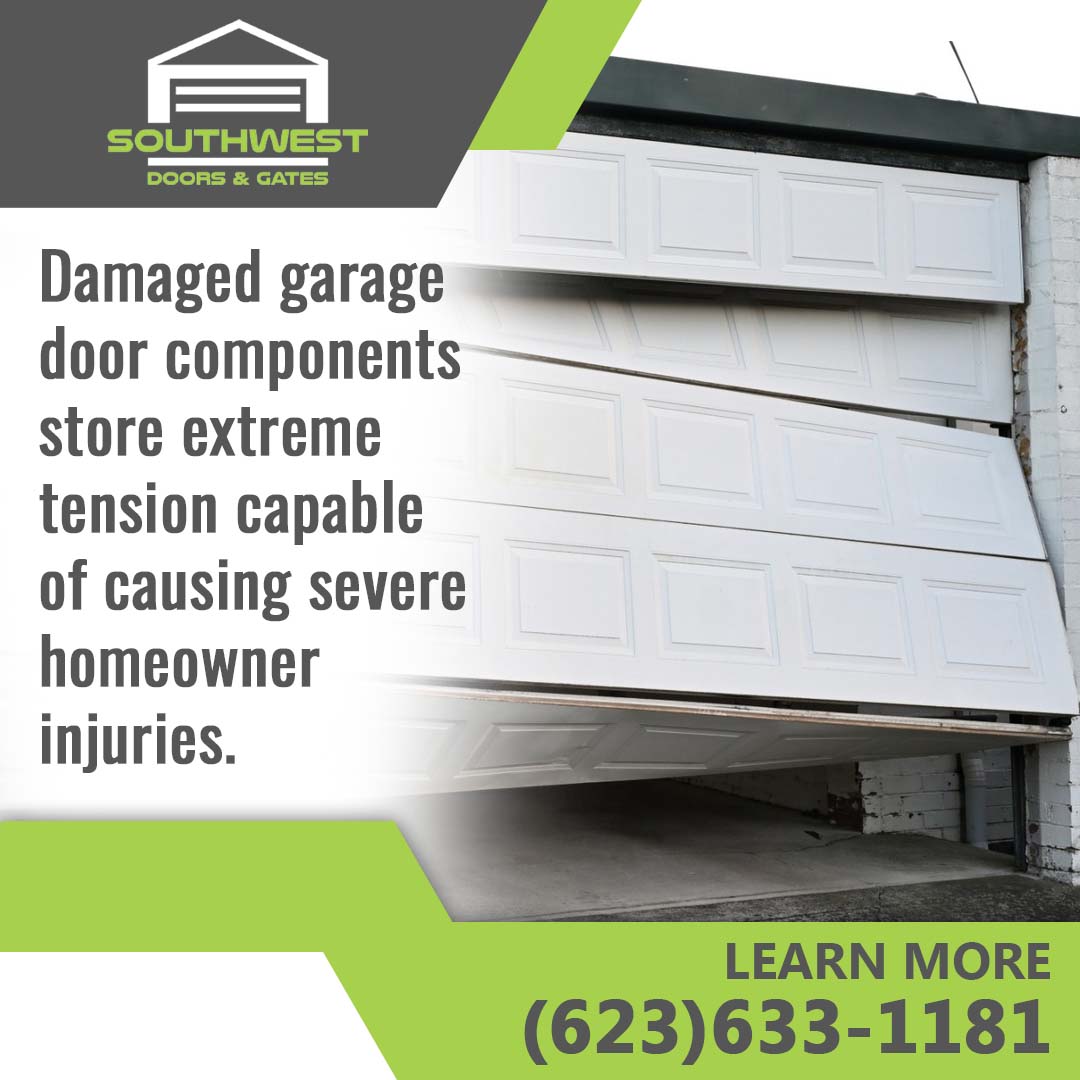 White paneled garage door crooked and fallen off its track with damaged panels leaning at an angle.